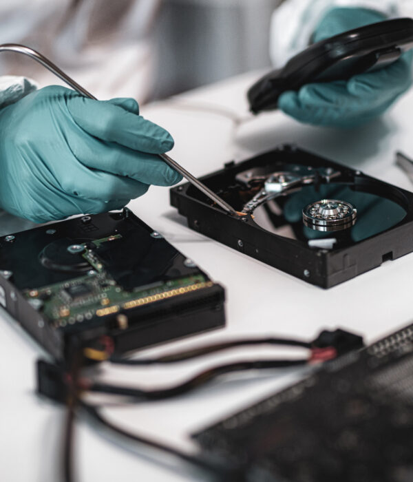 Forensic expert examining a hard drive